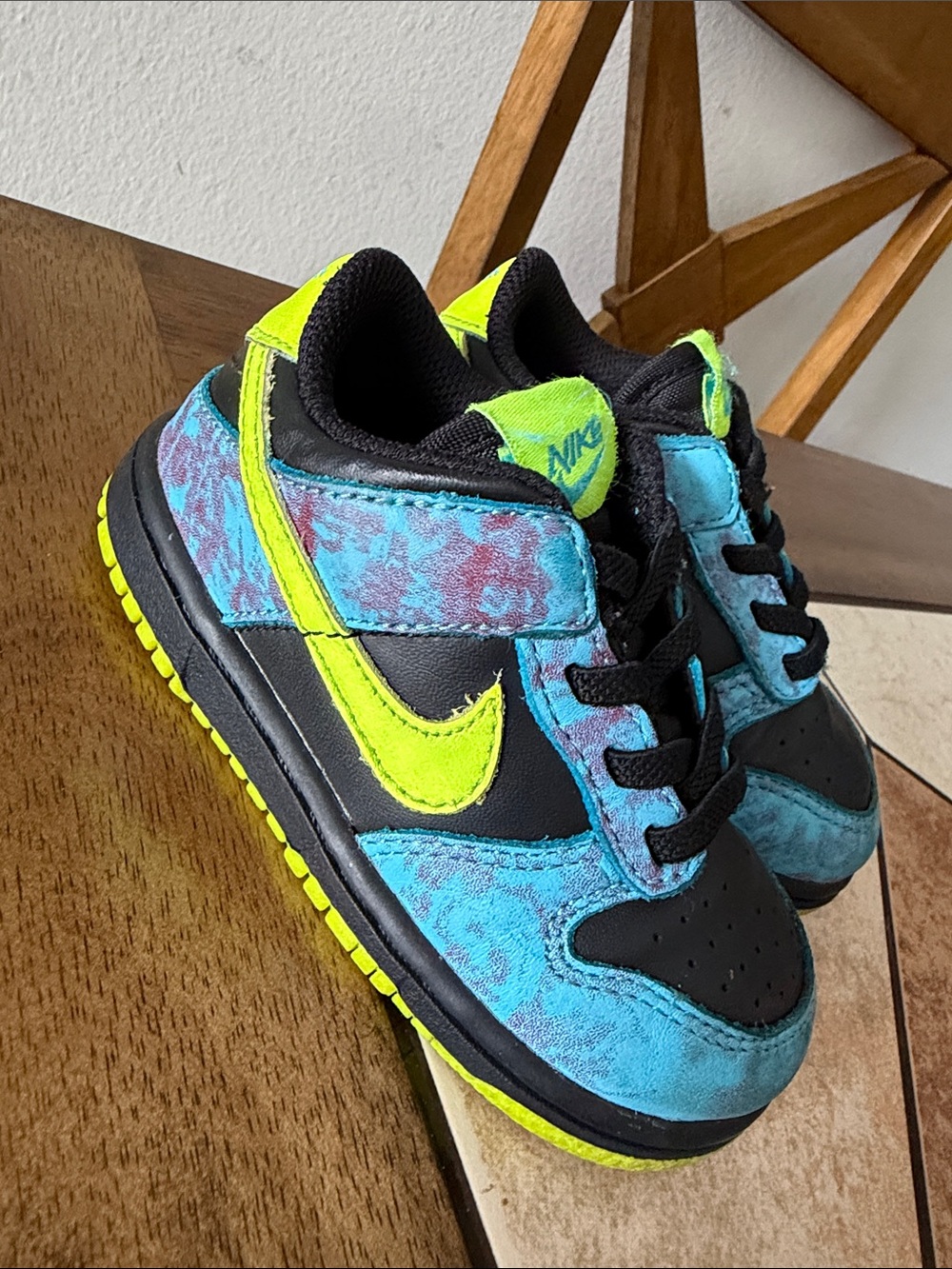 Nike Kids Black, Blue, and Neon Green Low-Top Sneakers